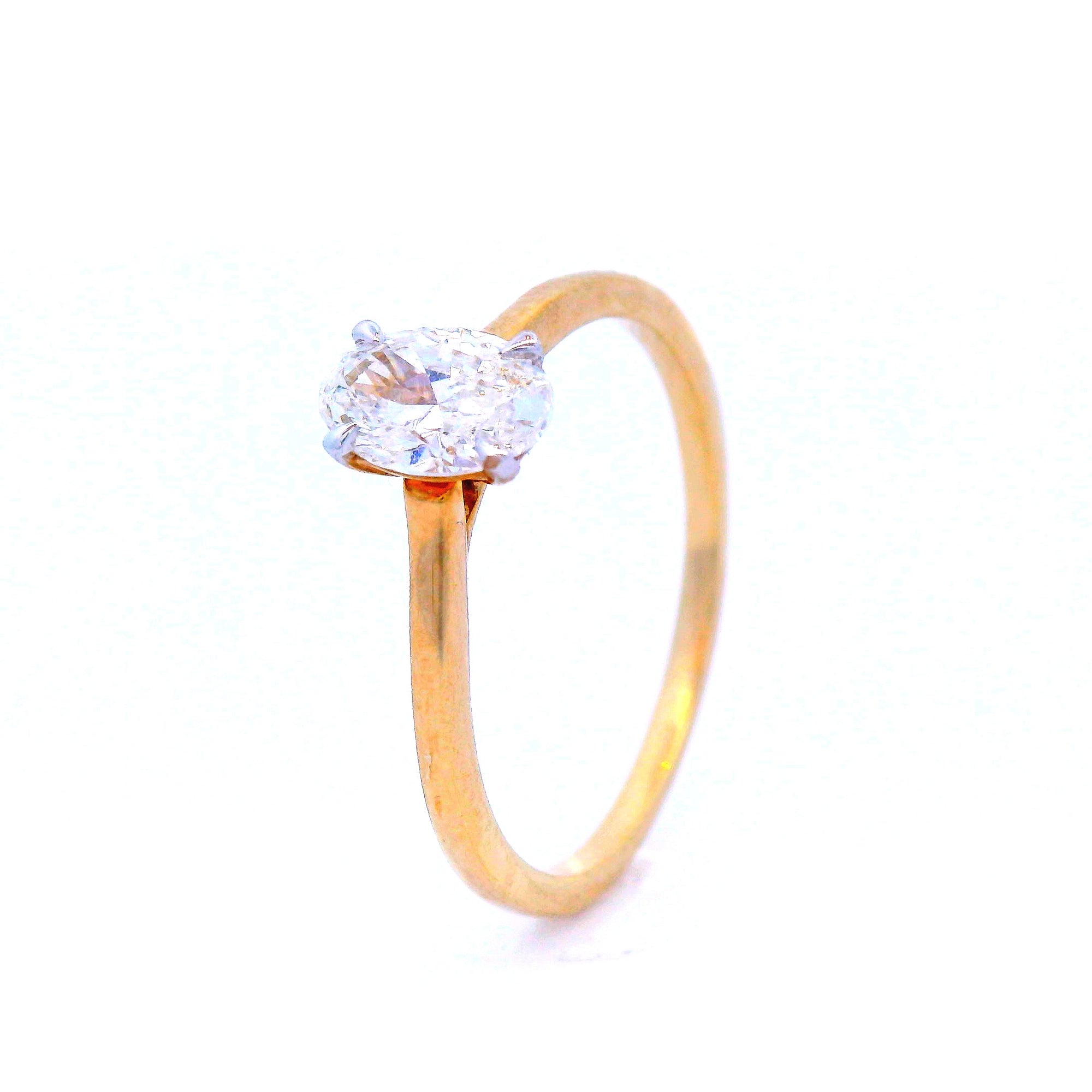 Oval Cut Diamond Set in Yellow Gold