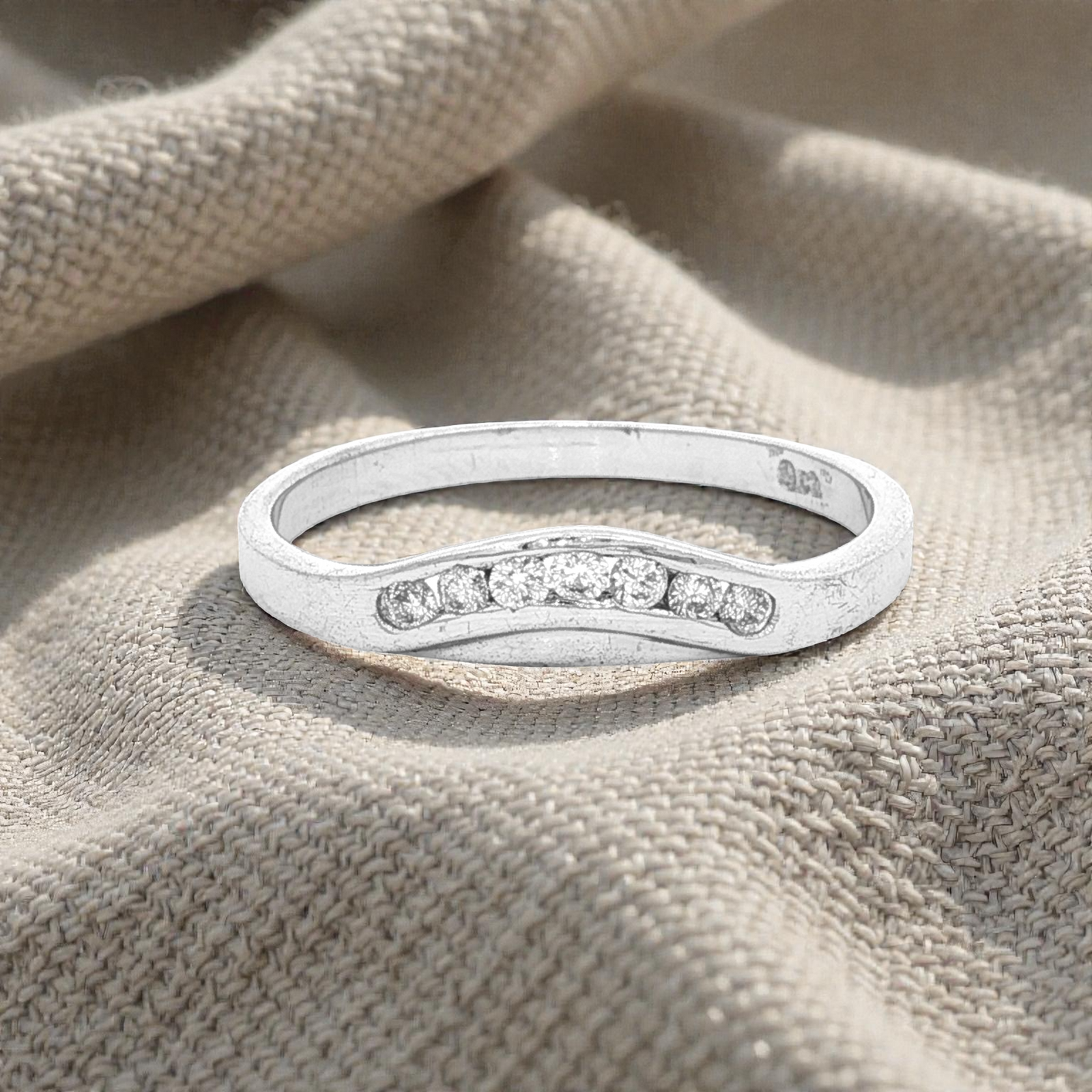 Curved Channel Diamond Eternity Ring in White Gold