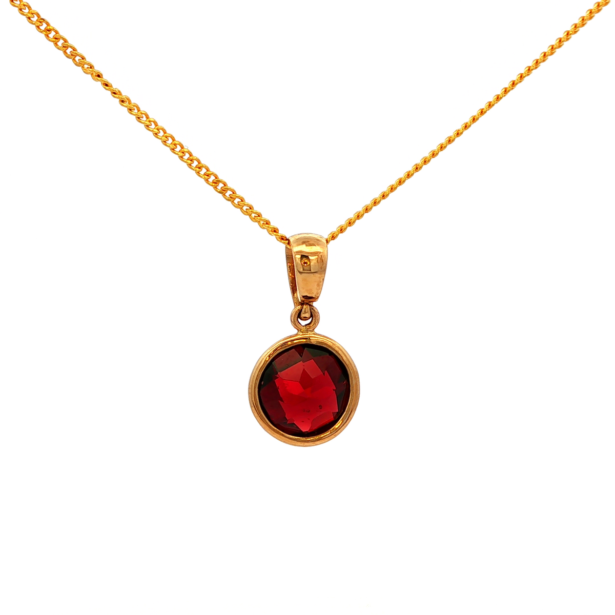 Round Faceted Garnet Pendant in Yellow Gold