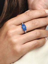 Sterling silver ring with princess blue crystal and clear cubic zirconia