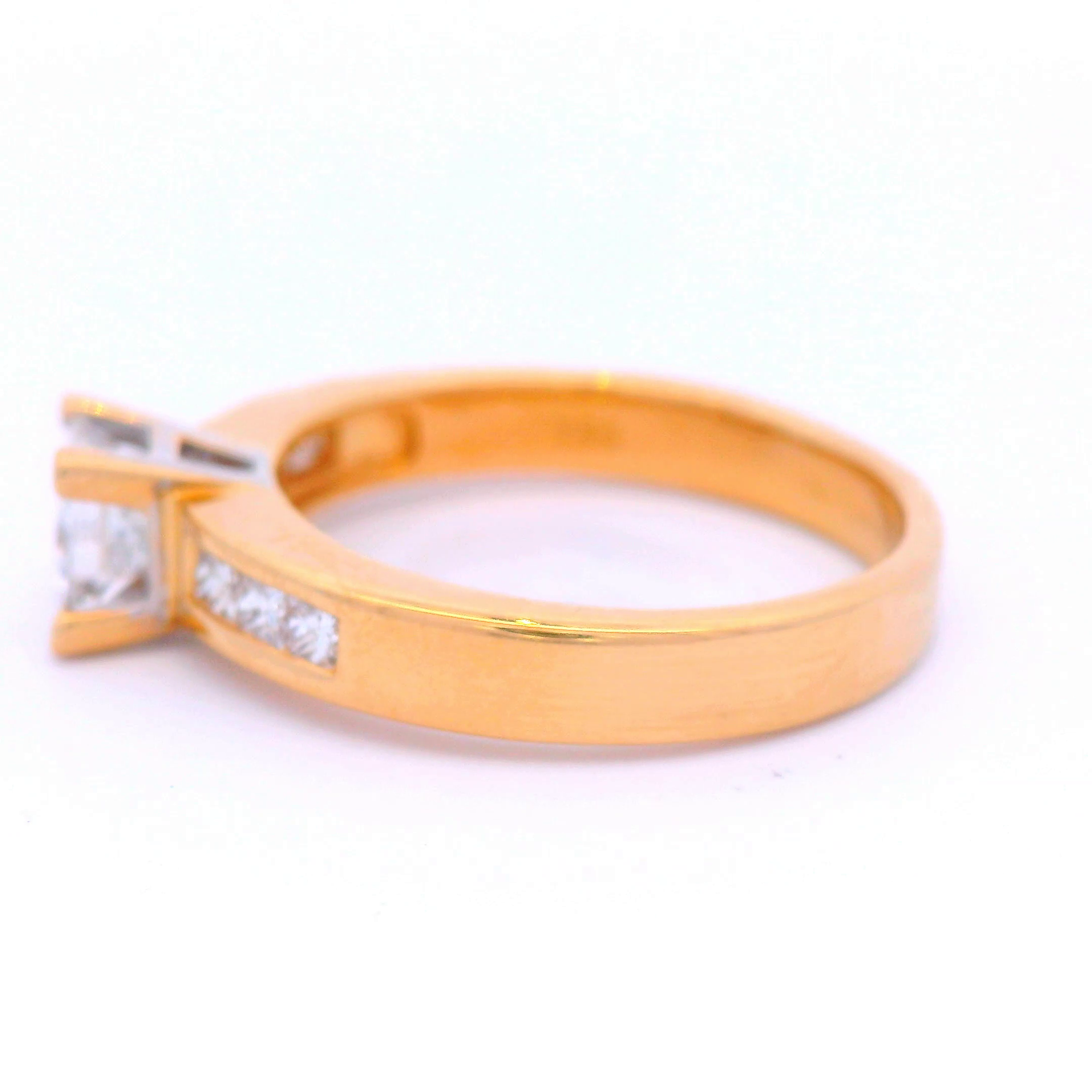 Princess Cut Diamond Set in Yellow Gold with Princess Cut Shoulders