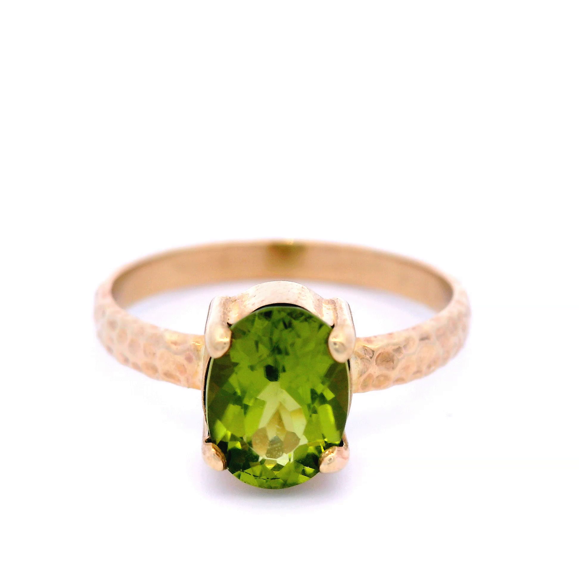 Oval Peridot in a 4 Claw Setting and Hammered Detail Band