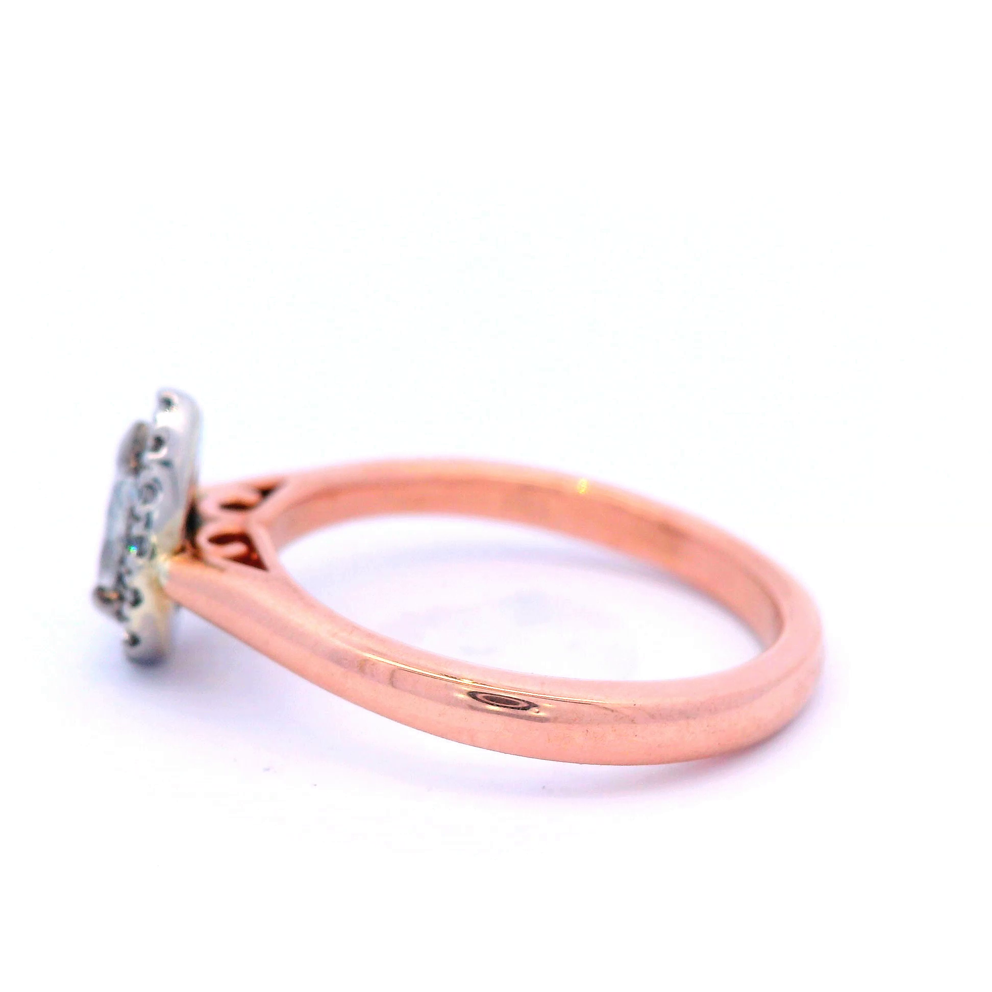 Halo Set Pear Shaped Diamond Engagement Ring set in Rose Gold