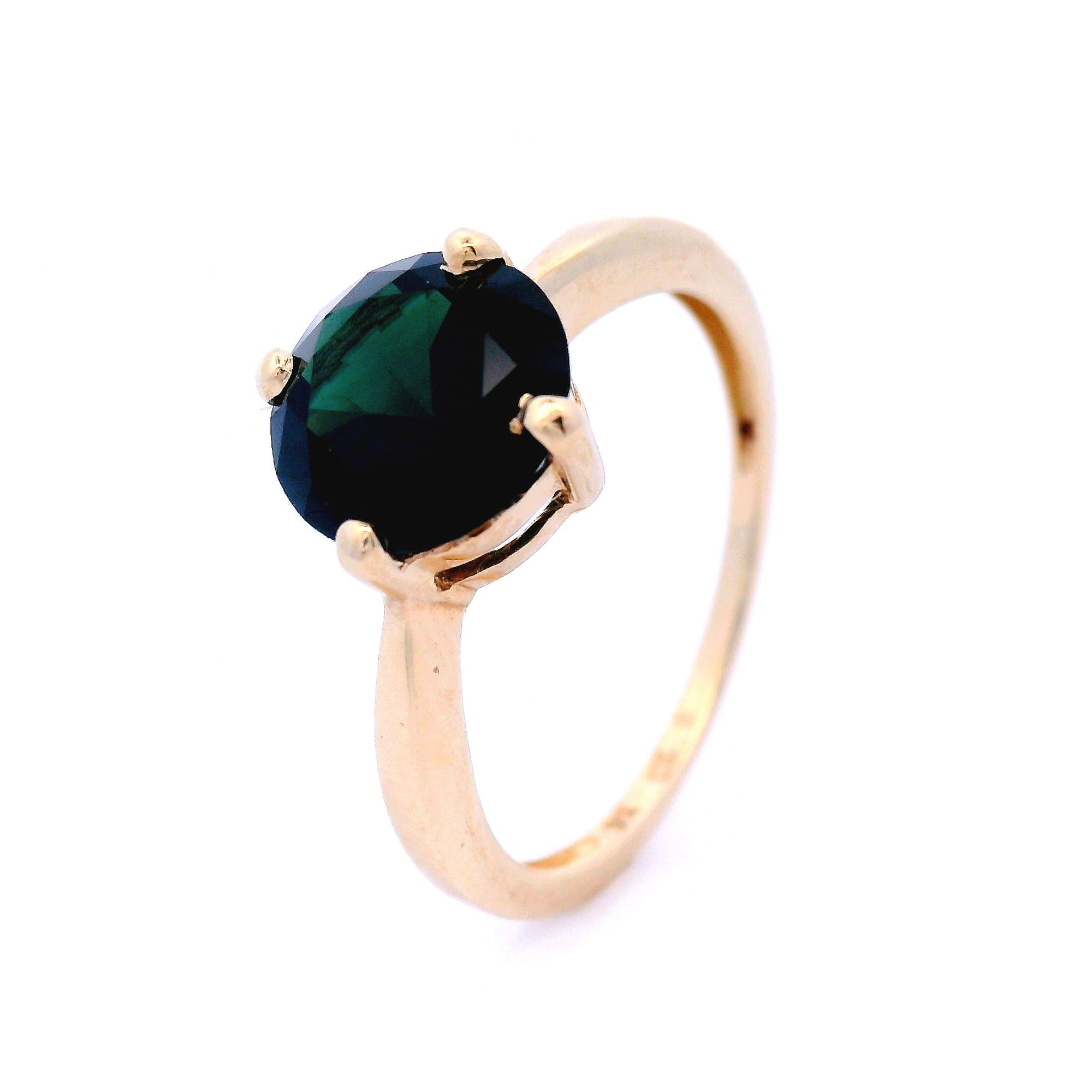 Round Blue/Green Sapphire, set in a 4 claw setting made of 9 Carat Yellow Gold