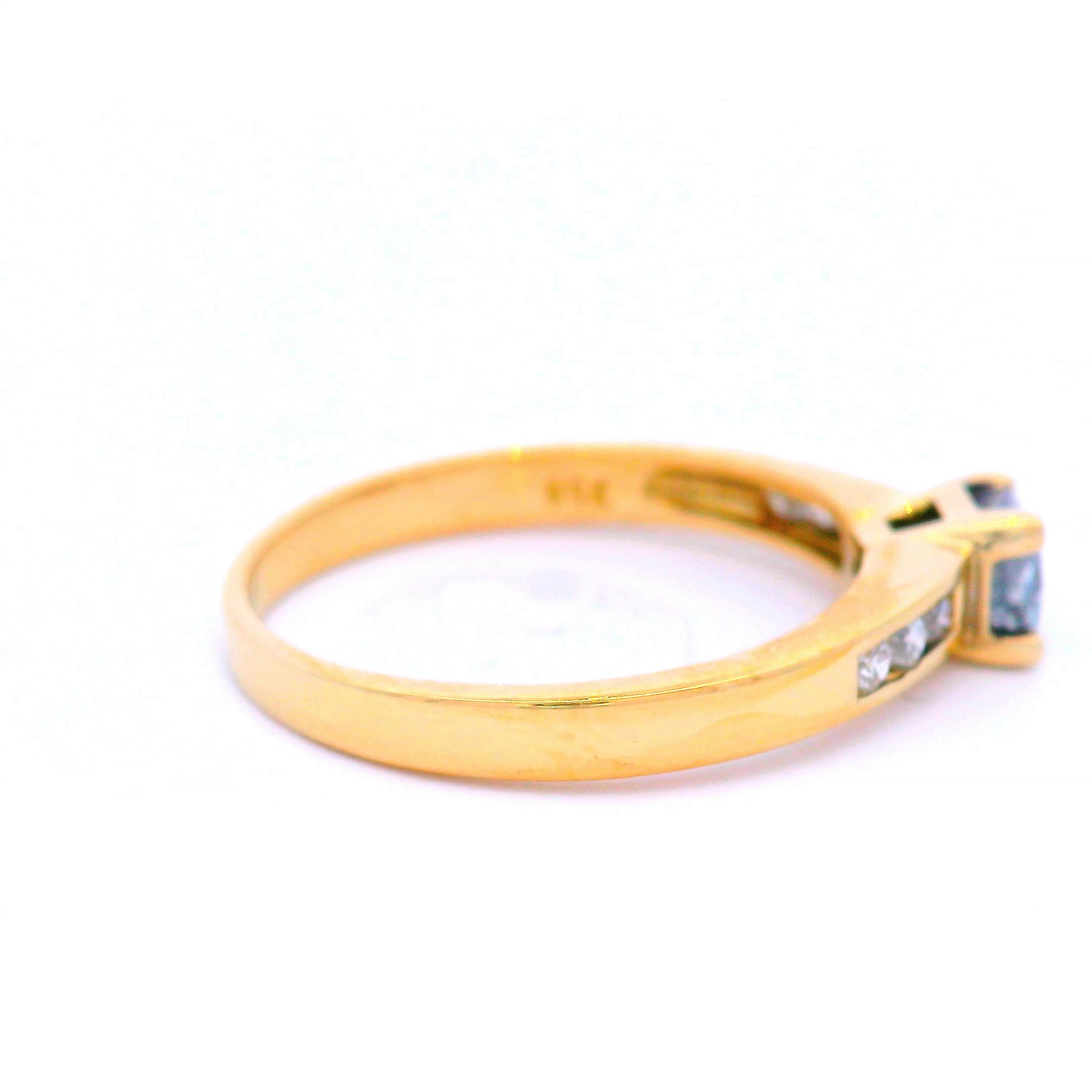 Princess Cut Diamond in Yellow Gold with Channel Set Shoulders