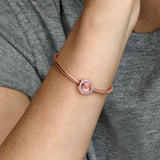 14k Rose gold-plated charm with blush pink crystal and clear cubic zirconia