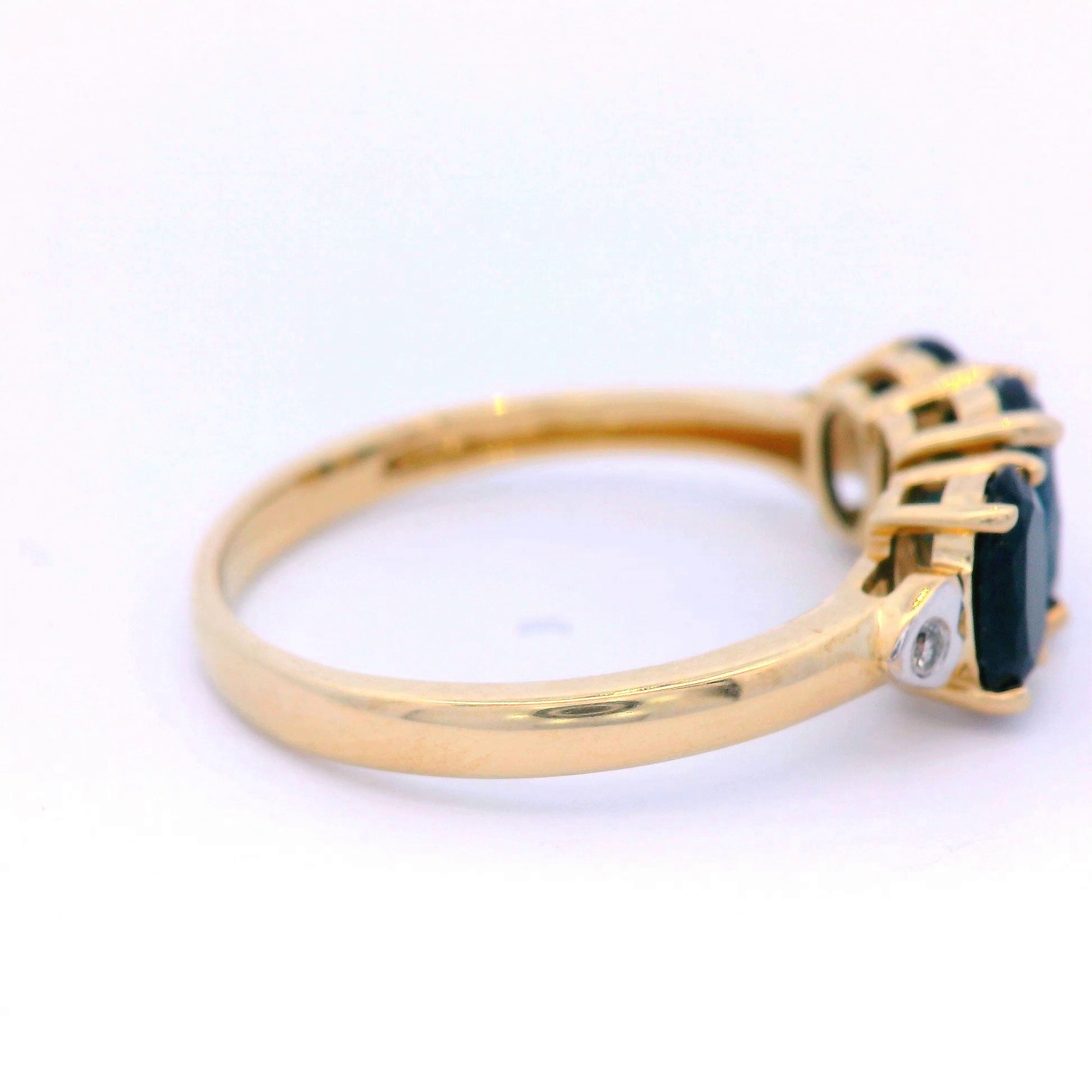 Oval Black Sapphire Dress Ring Set in Yellow Gold