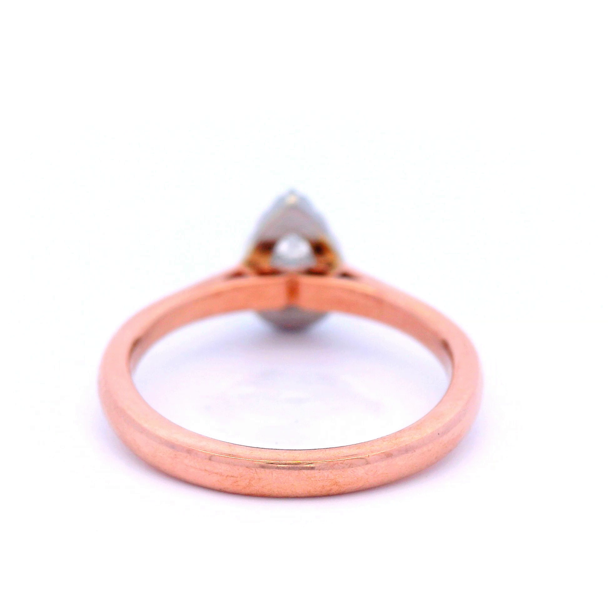 Halo Set Pear Shaped Diamond Engagement Ring set in Rose Gold