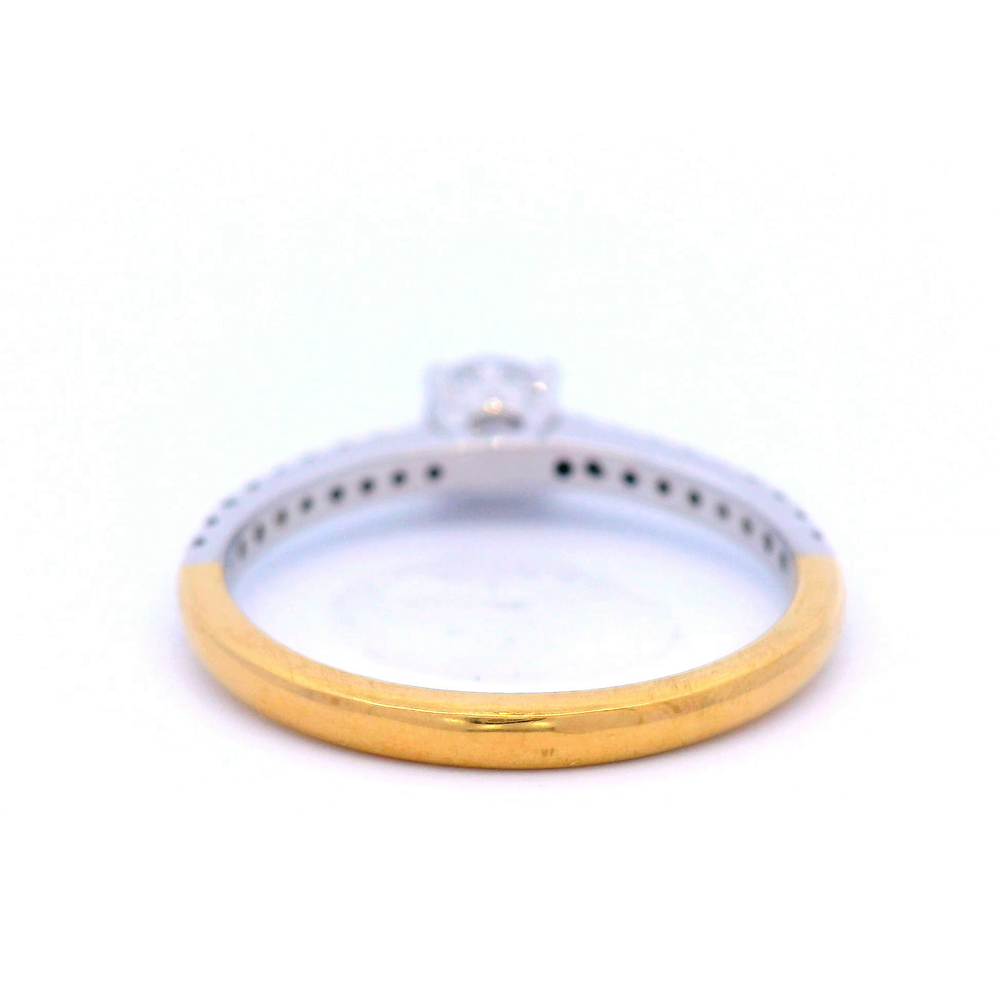 Round Brilliant Cut Diamond Set in a Two Tone White/Yellow Gold Ring