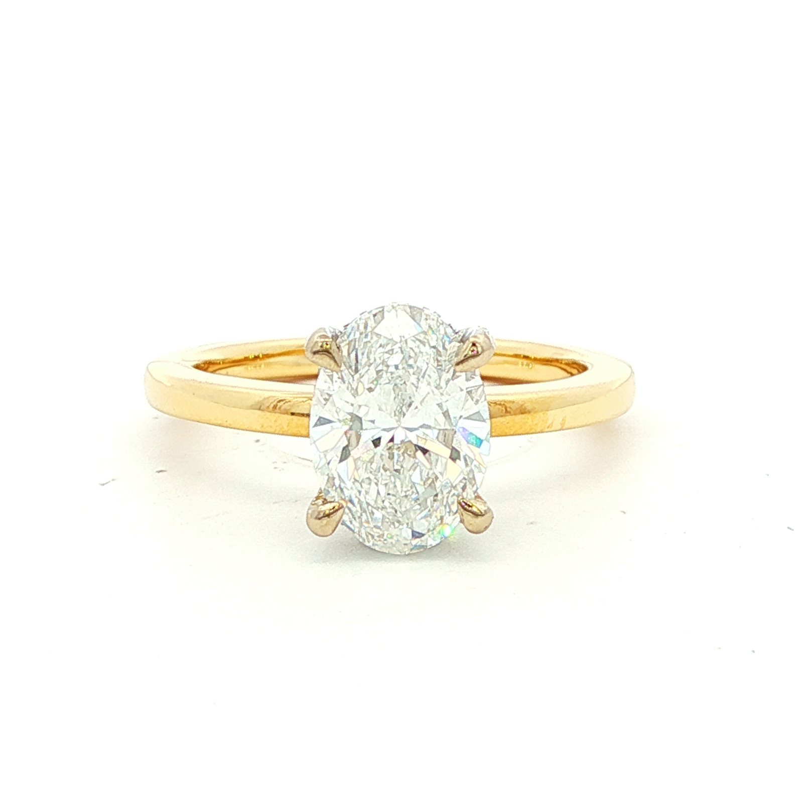 Oval Diamond Solitaire Ring in Yellow Gold
