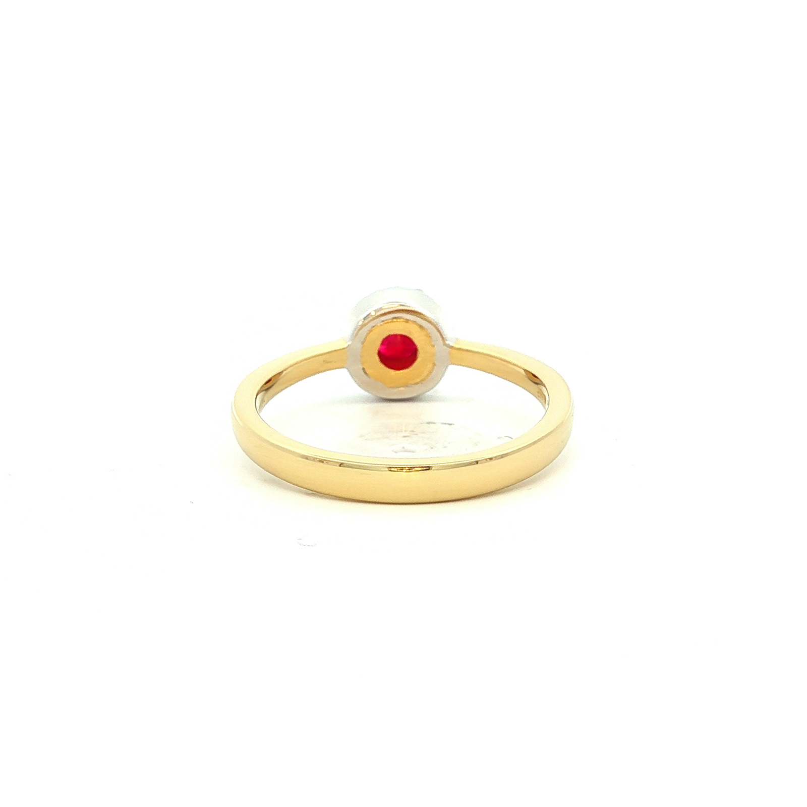 Ruby and Diamond Halo Ring in Yellow Gold
