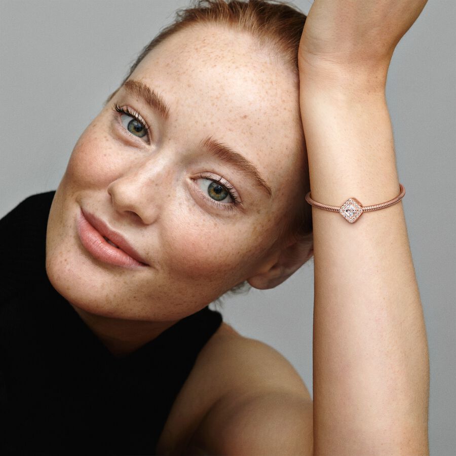 14k Rose gold-plated charm with clear cubic zirconia