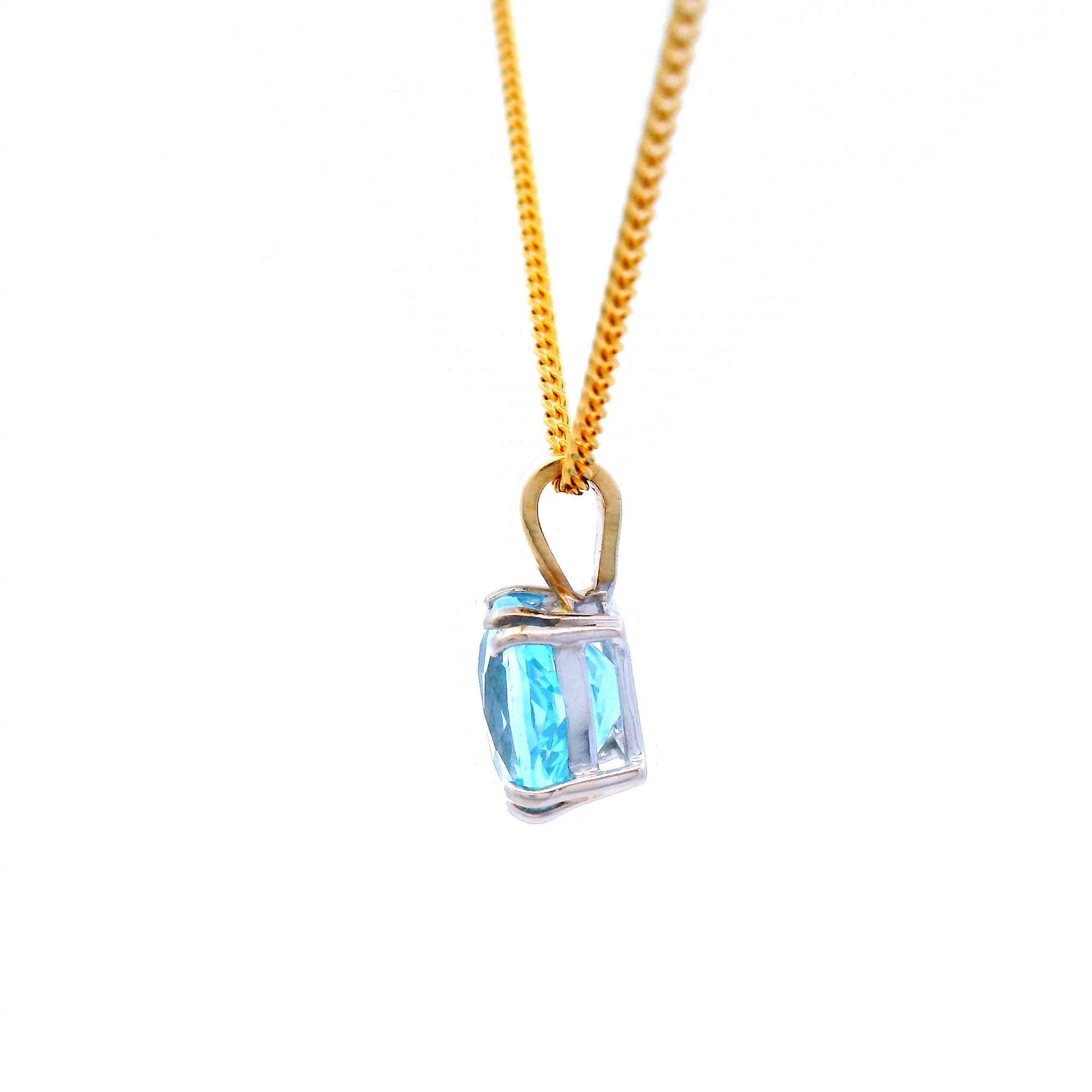 Blue Topaz Pendant in Yellow Gold