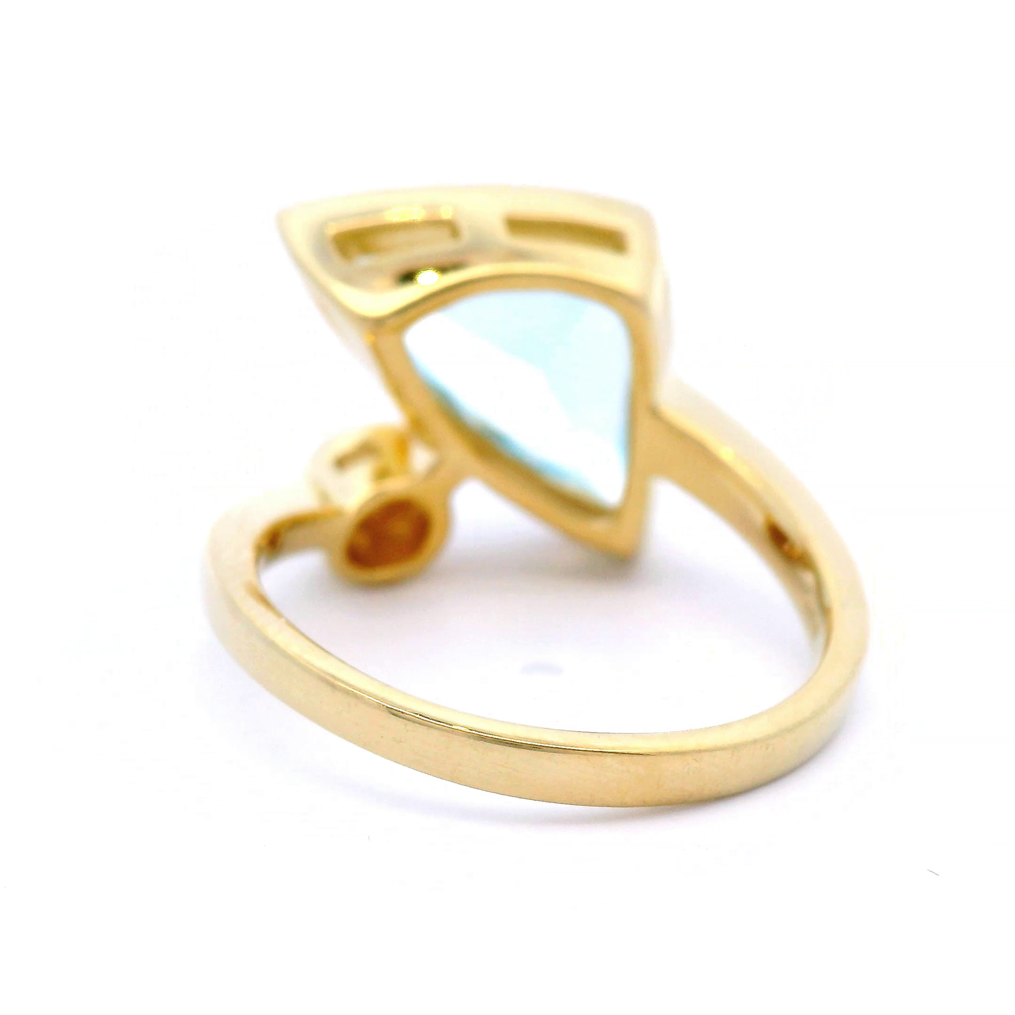 Blue Topaz and Diamond Dress Ring in Yellow Gold