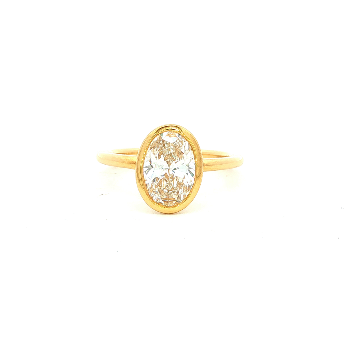 Oval Bezel Solitaire Ring in Yellow Gold