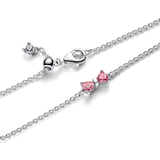 Bow sterling silver bracelet with fancy pink and clear cubic zirconia