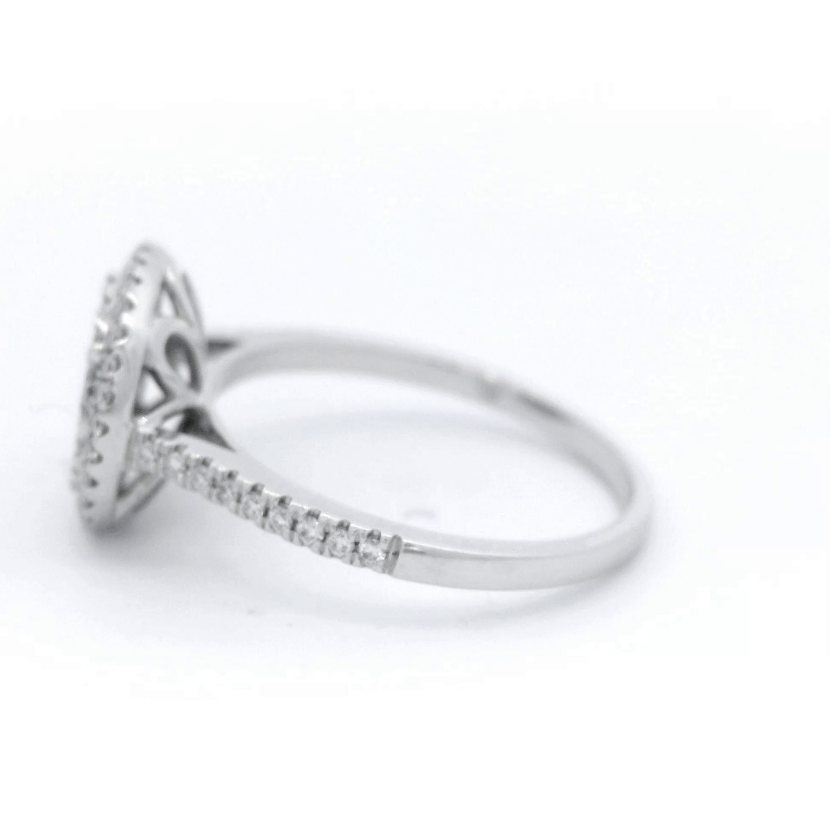 Round Halo Diamond Ring set in 18 Carat White Gold