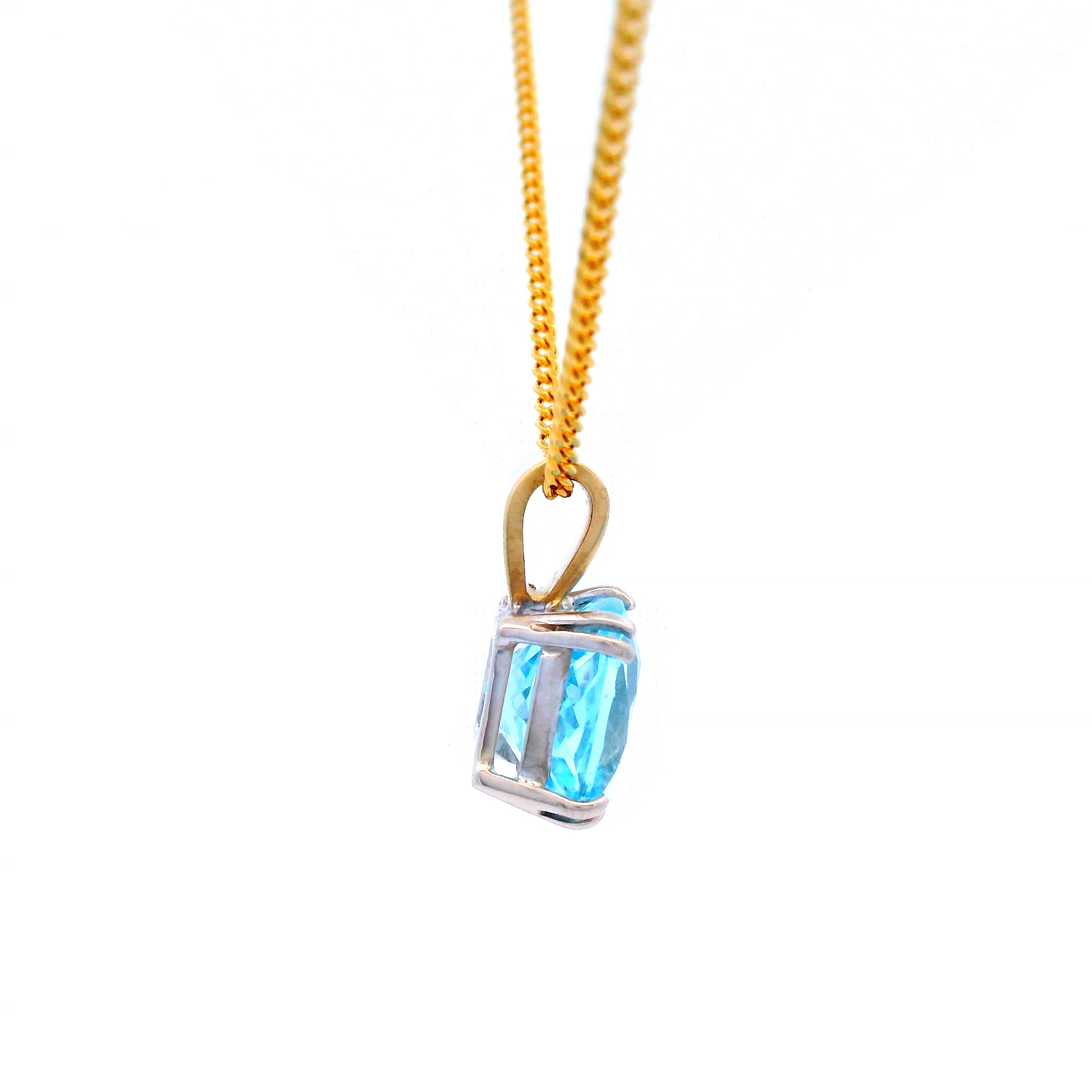 Blue Topaz Pendant in Yellow Gold