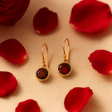 Round faceted Garnet Earrings in Yellow Gold