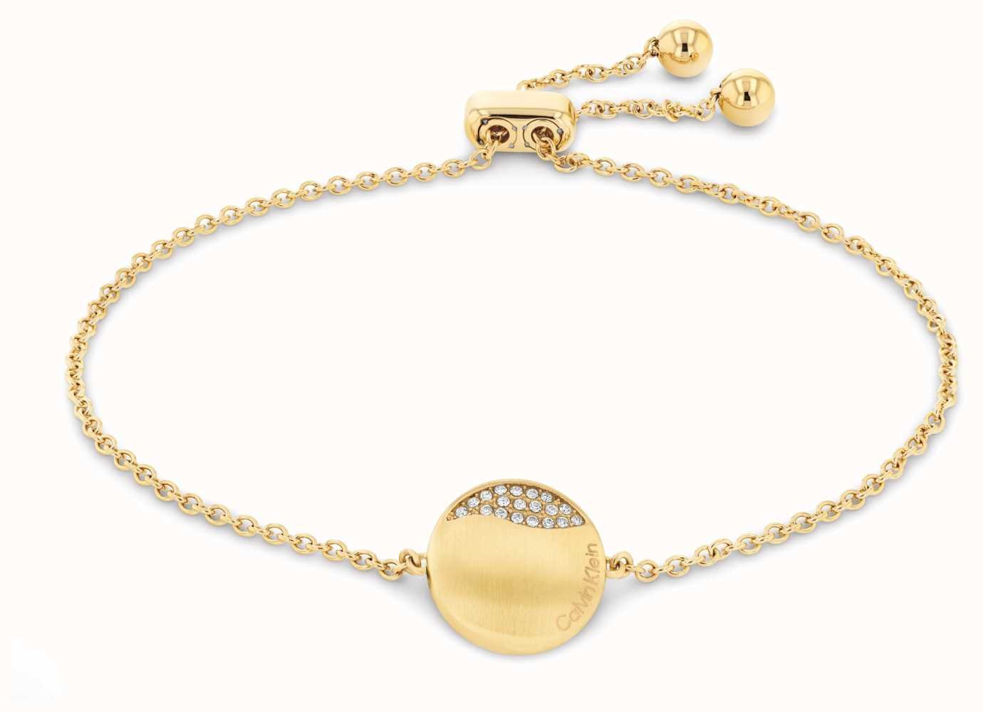 Calvin Klein Gold Tone Crystal Set Disc Bracelet.