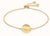 Calvin Klein Gold Tone Crystal Set Disc Bracelet.