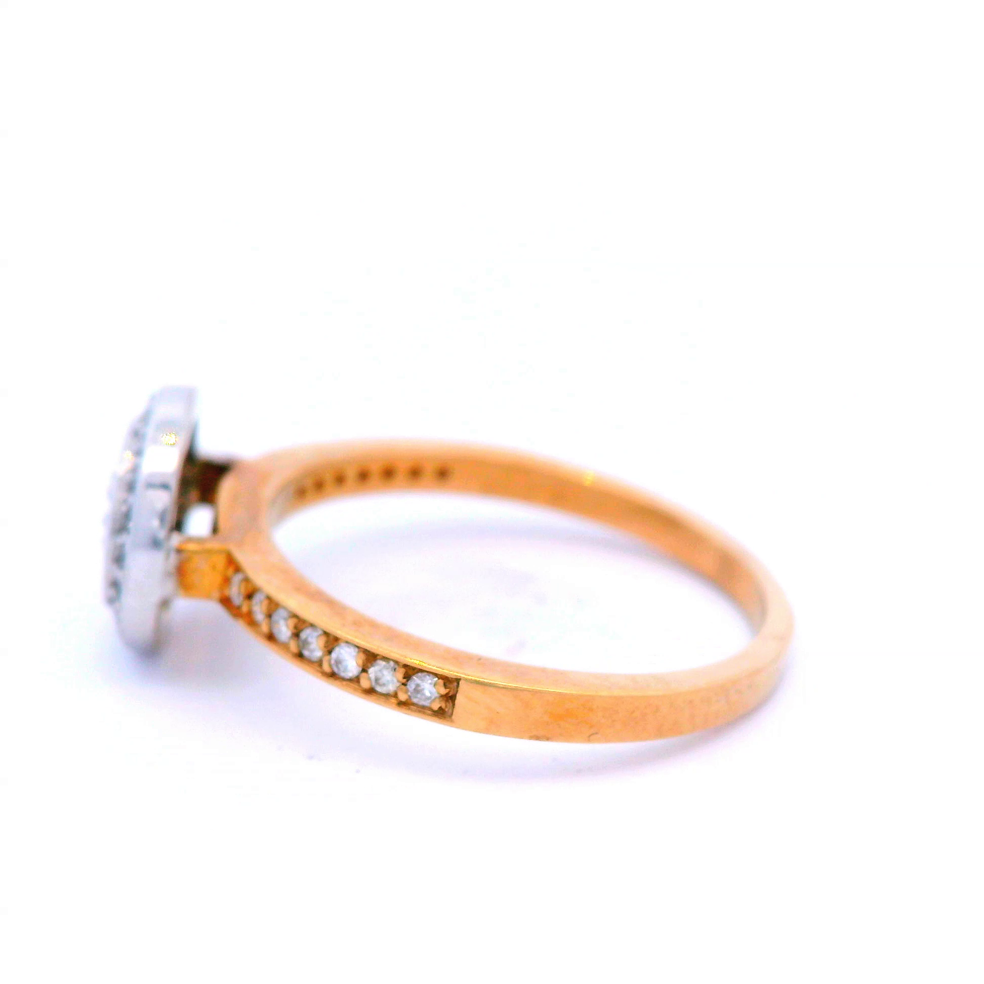 Halo Set Diamond Ring in a Two Tone Gold