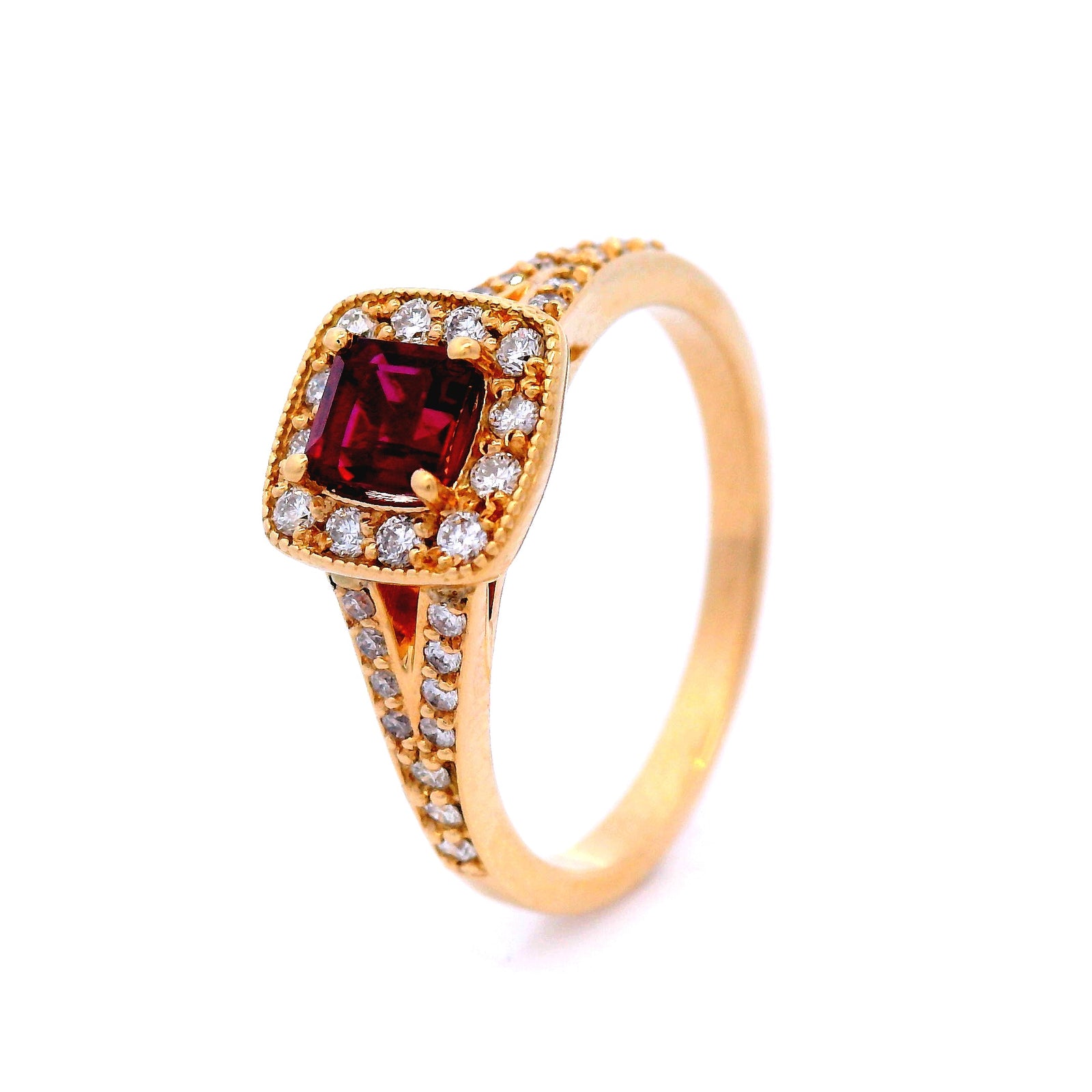 Ruby and Diamond Halo Set Ring in Yellow Gold