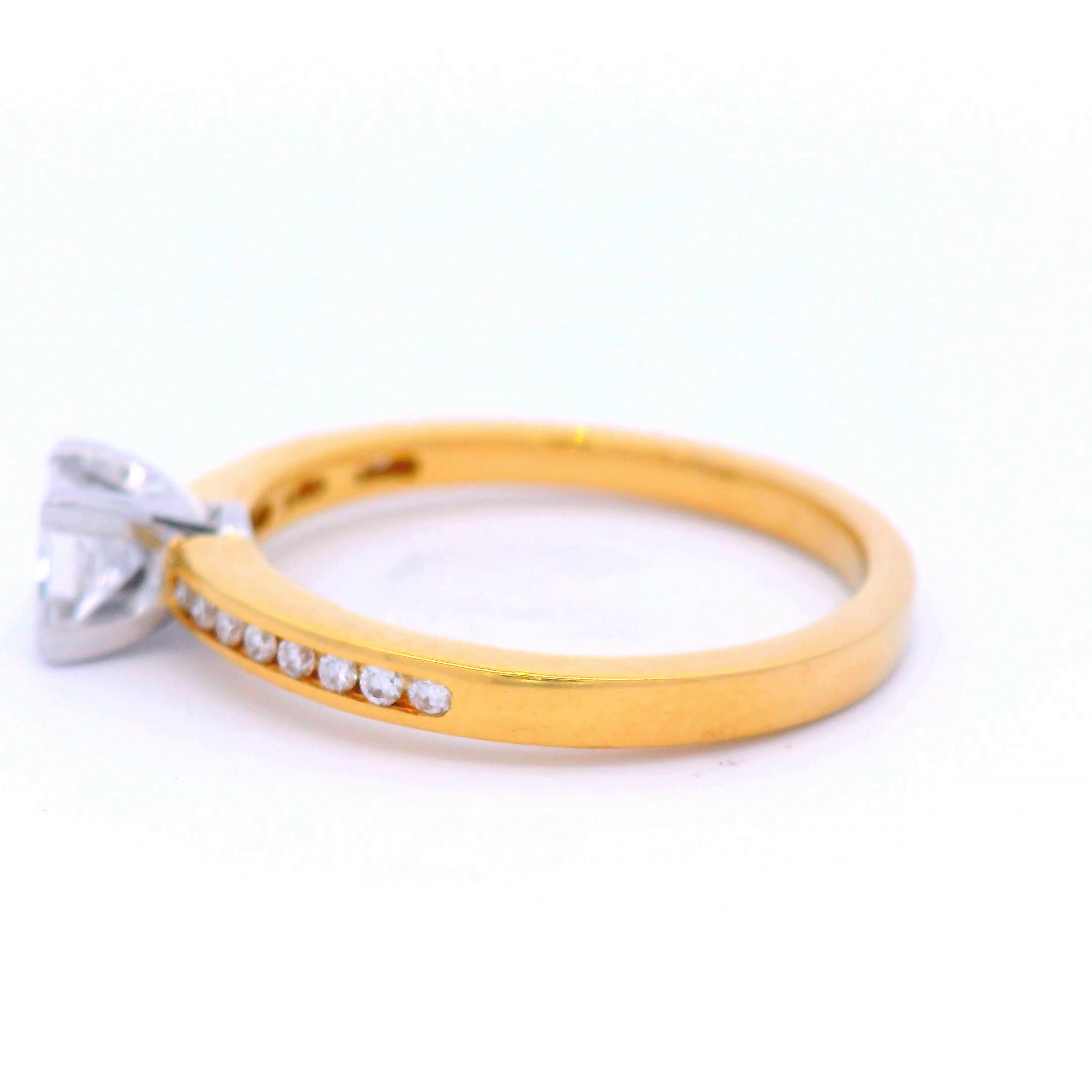 Princess Cut Diamond Set in Yellow Gold