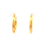 Round Huggie Earrings in Yellow Gold