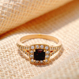 Ruby and Diamond Halo Set Ring in Yellow Gold