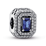 Sterling silver charm with princess blue crystal and clear cubic zirconia