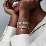 14k Rose gold-plated charm with clear cubic zirconia