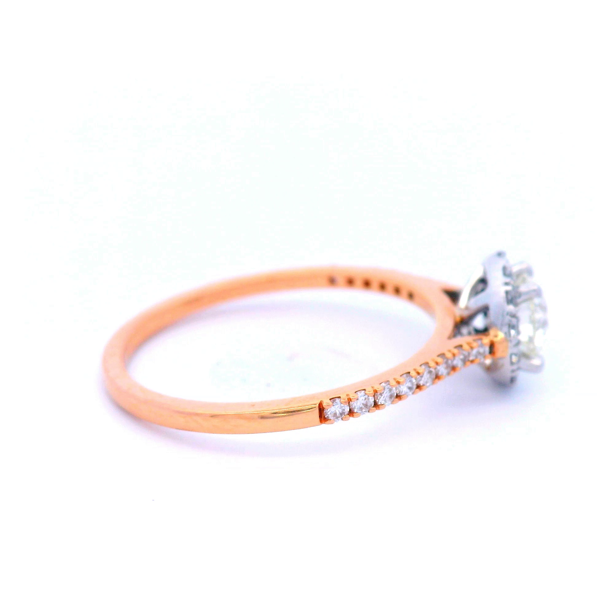 Diamond Halo Engagement Ring in18 Carat Rose Gold