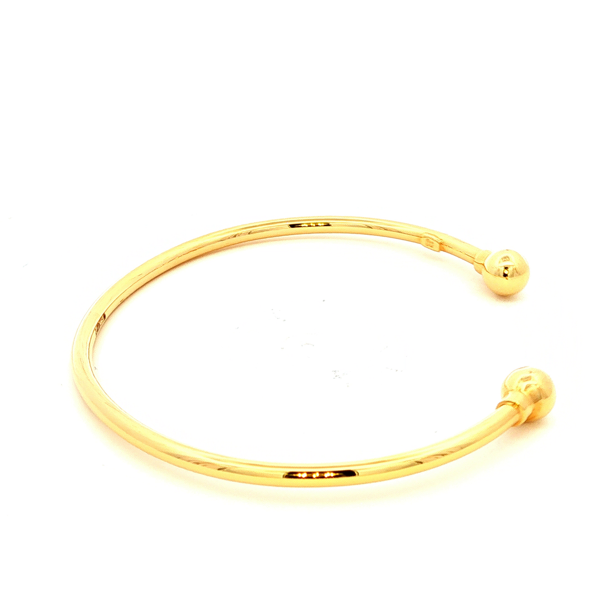 Hollow Ball End Cuff Bangle in Yellow Gold