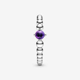 Sterling silver ring with treated purple topaz