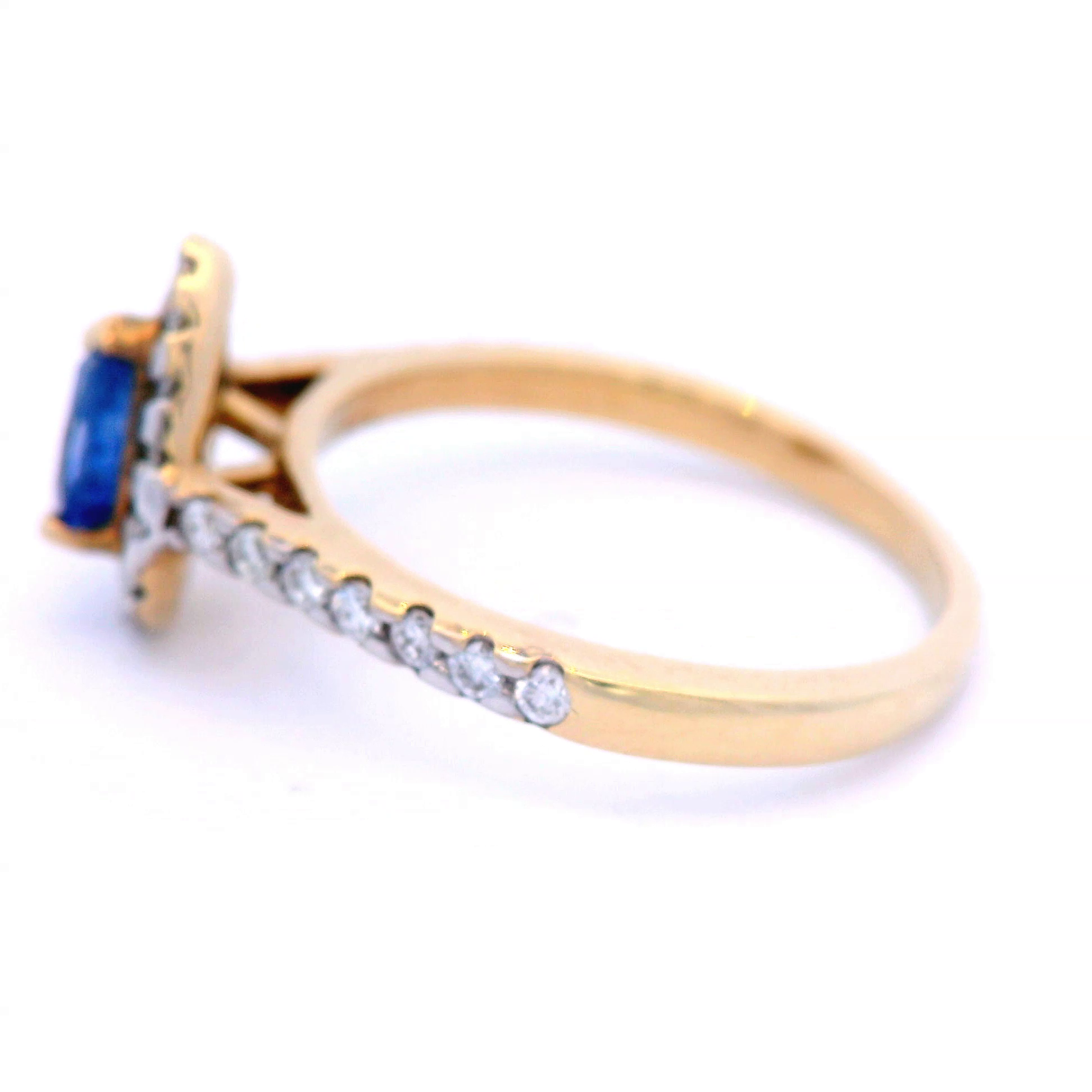 Pear Shaped Ceylon Sapphire with Diamond Halo Set Dress Ring