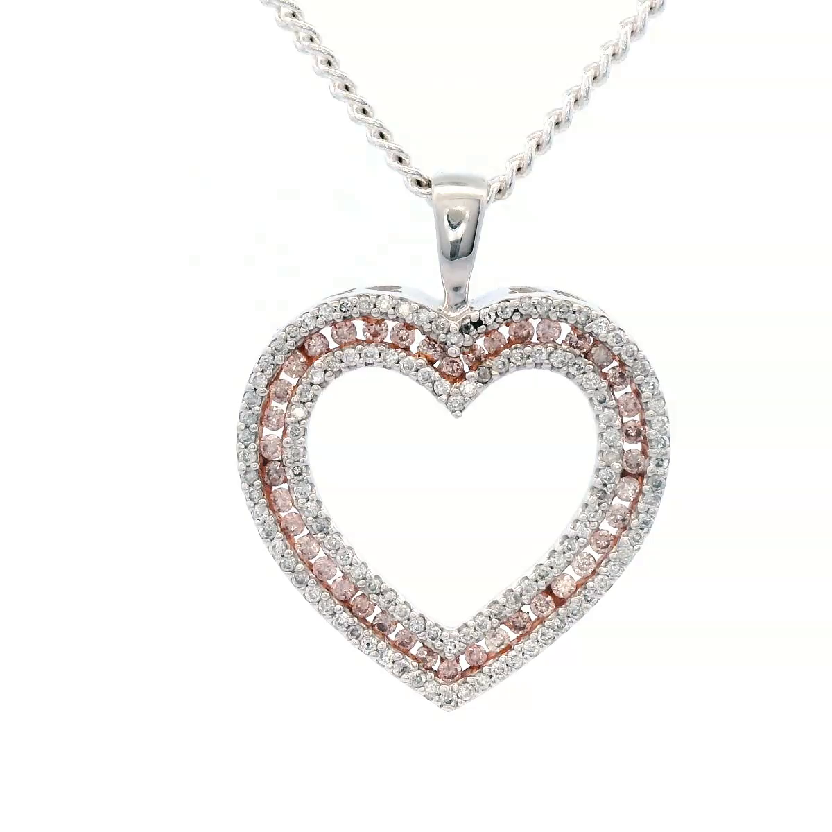 Natural Pink and White Diamond Set in an Open Heart Pendant