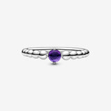 Sterling silver ring with treated purple topaz