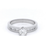 18ct White Gold Brilliant with Channel Set Shoulders