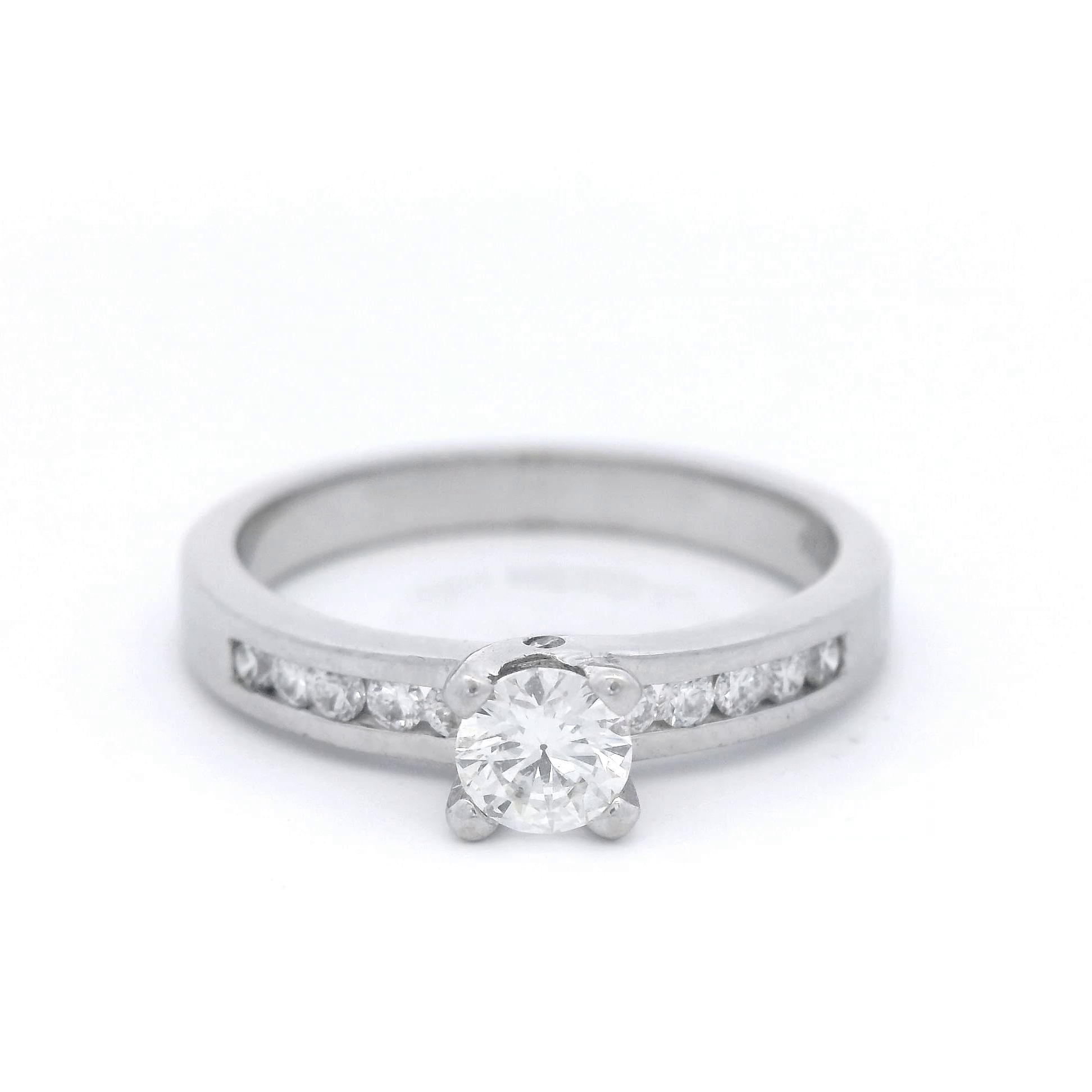 18ct White Gold 0.30ct Brilliant with Channel Set Shoulders