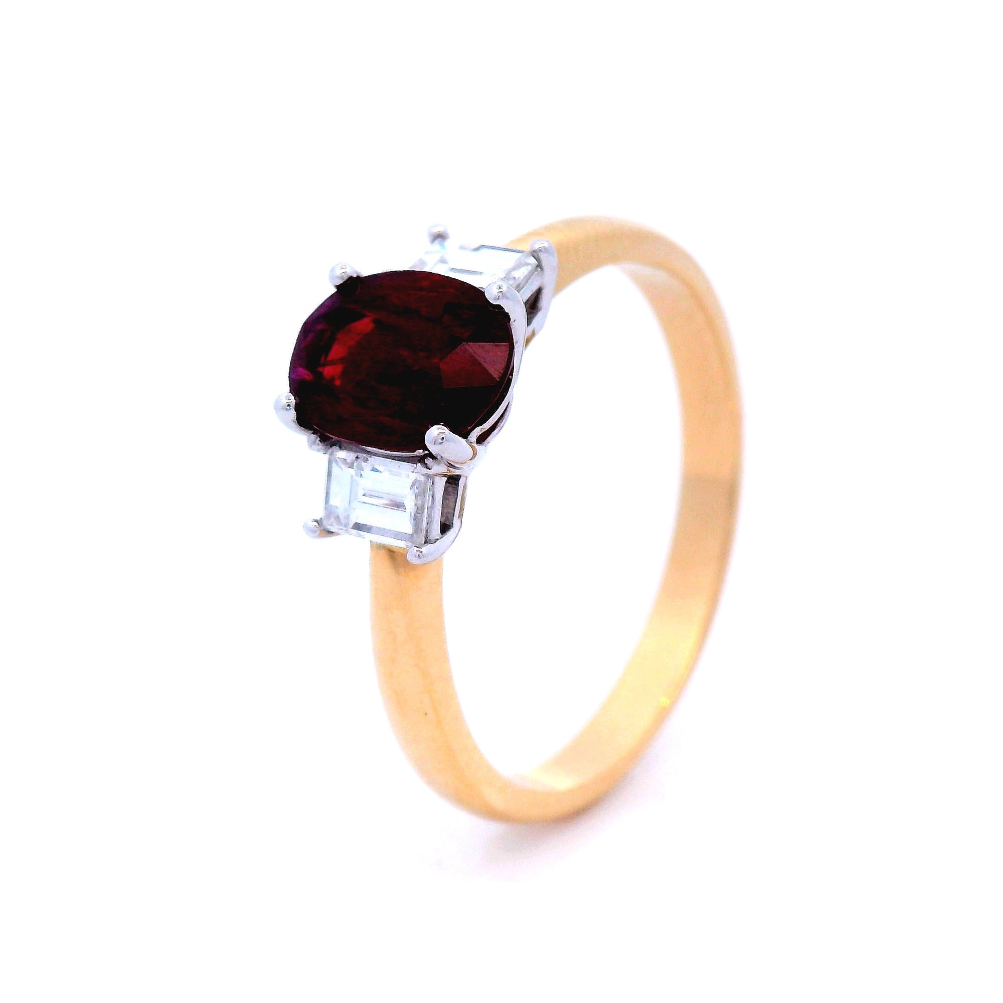 Oval Red Ruby Set in 4 Claw Yellow Gold Setting