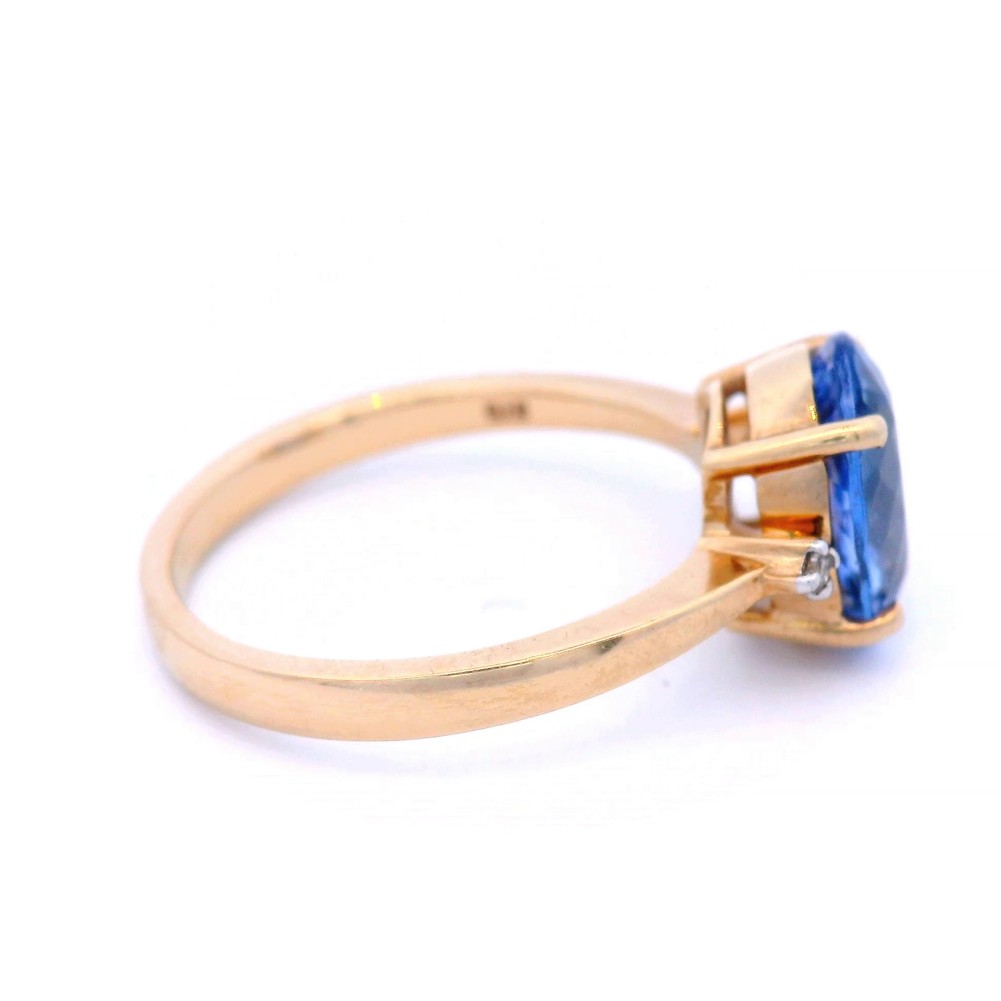 Natural Oval Tanzanite with Diamond Dress Ring in Yellow Gold