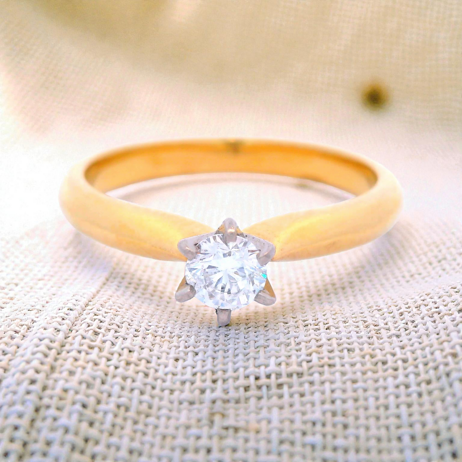 Diamond in a 6 Claw Yellow Gold Setting