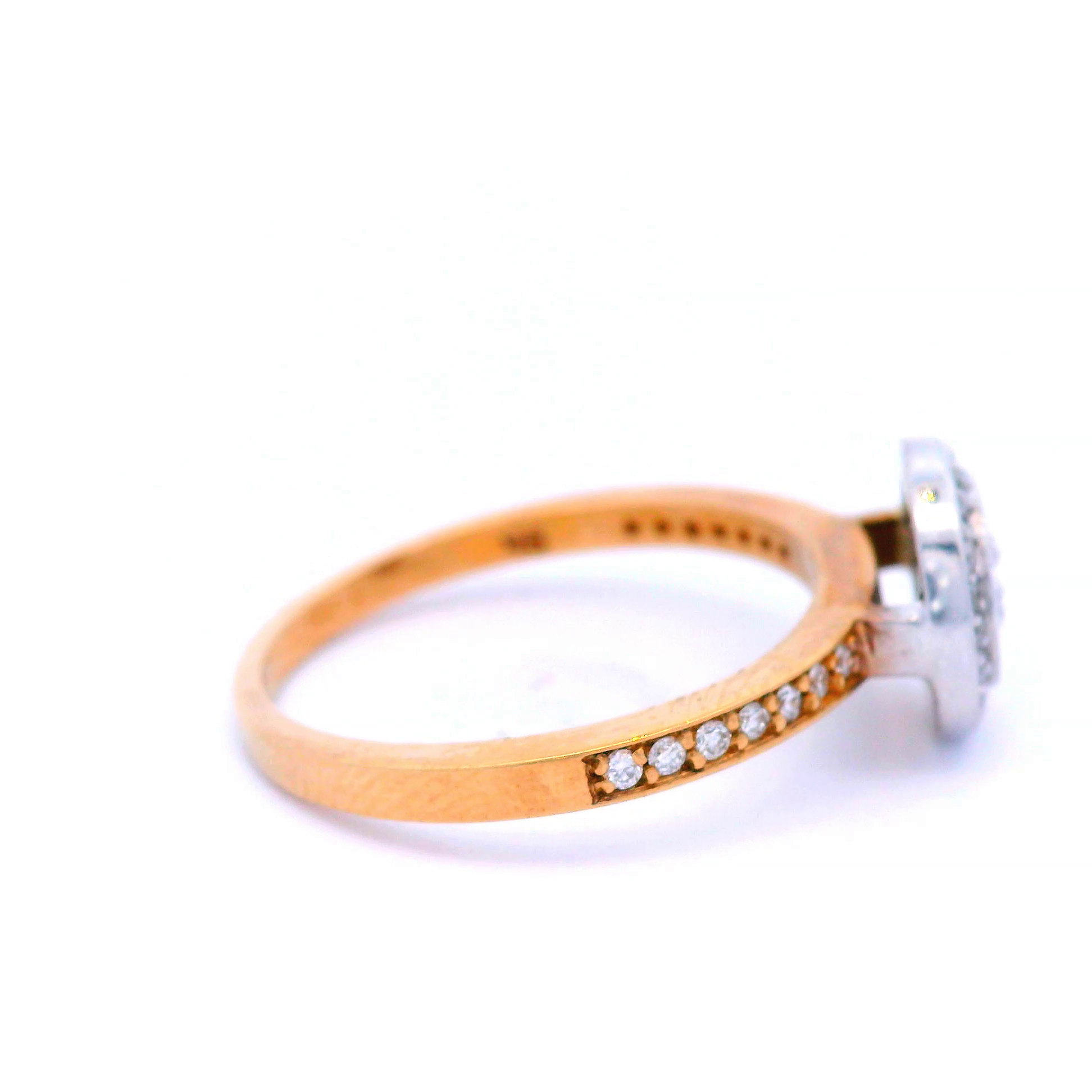 Halo Set Diamond Ring in a Two Tone Gold