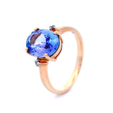 Natural Oval Tanzanite with Diamond Dress Ring in Yellow Gold