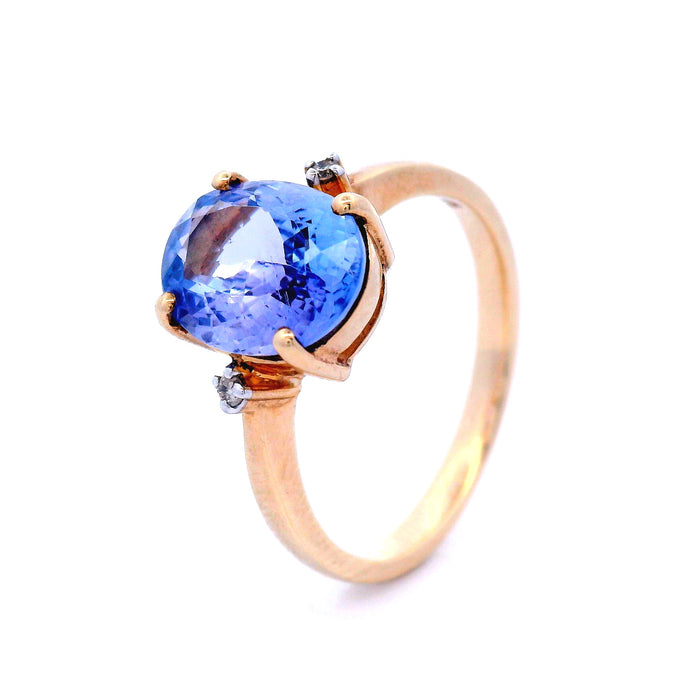 Natural Oval Tanzanite with Diamond Dress Ring in Yellow Gold