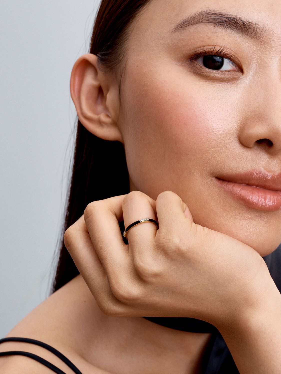 14k Gold-plated ring with clear cubic zirconia and black enamel