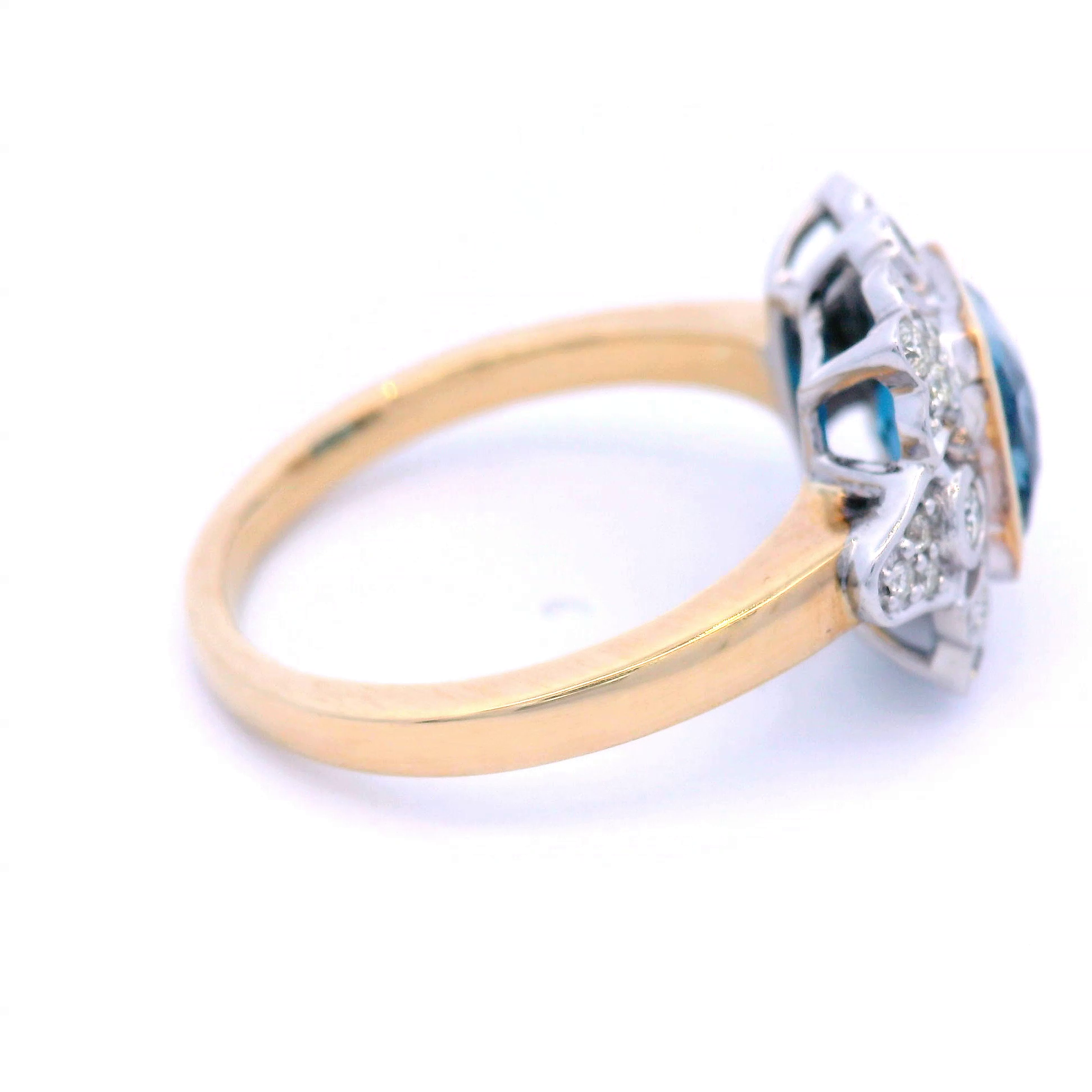 9 Carat Yellow Gold Diamond and London Blue Topaz Ring