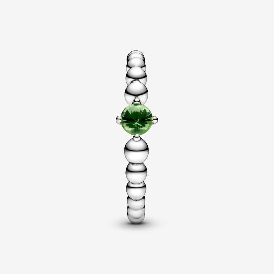 Sterling silver ring with treated spring green topaz