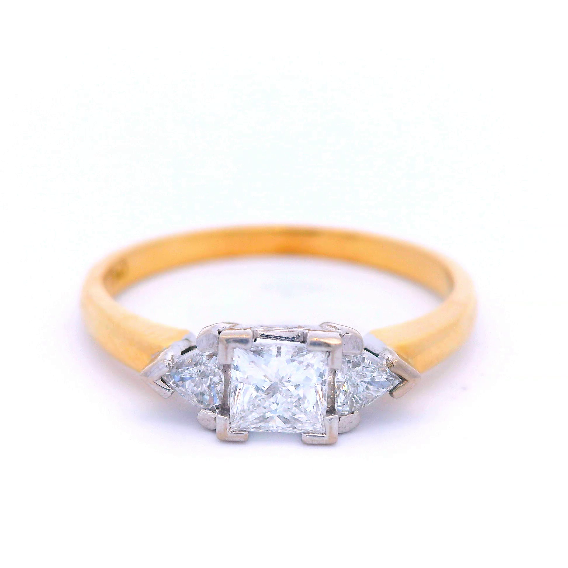 Trilogy Princess Cut and Trilliant Diamond Engagement Ring in Yellow Gold